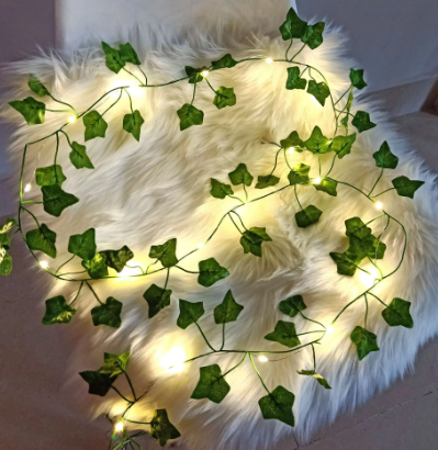 Plantes grimpantes décoratives avec lumières